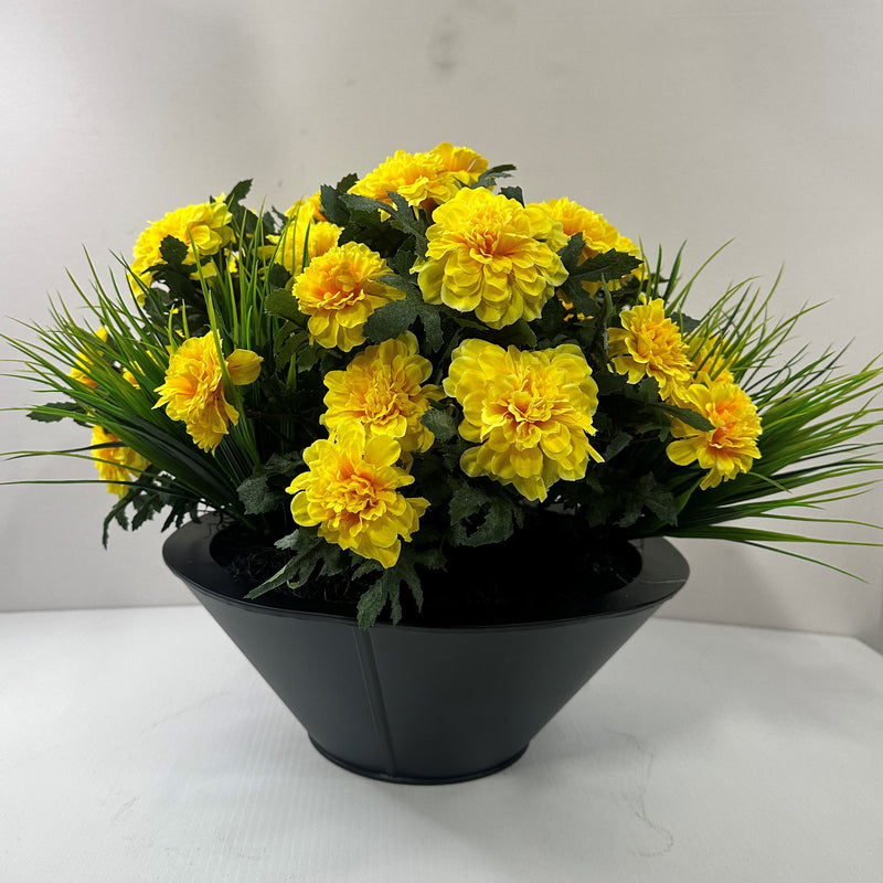 Marigold dish with grass